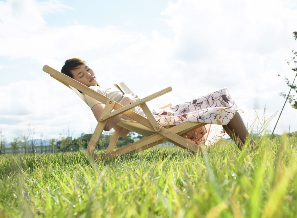 The Coaching Muse Young Woman Sleeping on Lawn Chair